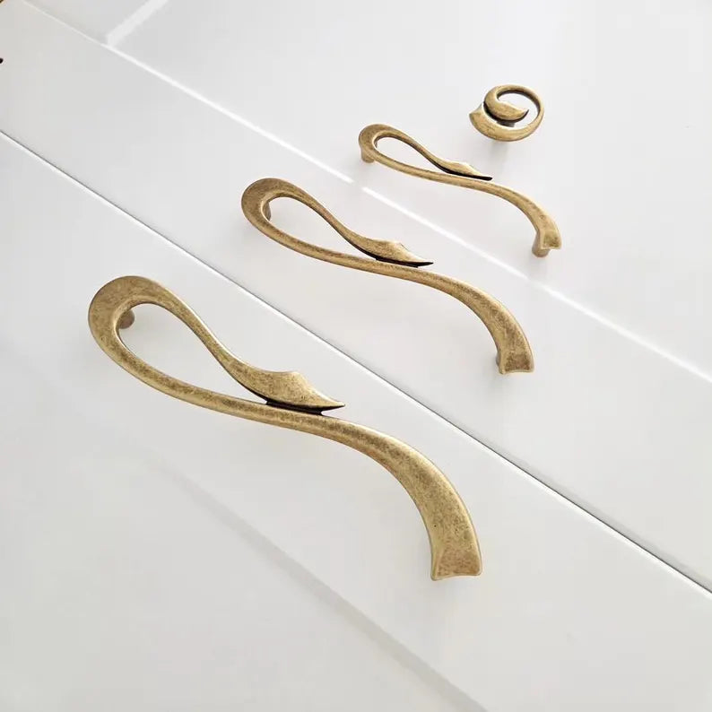 Elegant Curved Cabinet Handles – Antique Brass